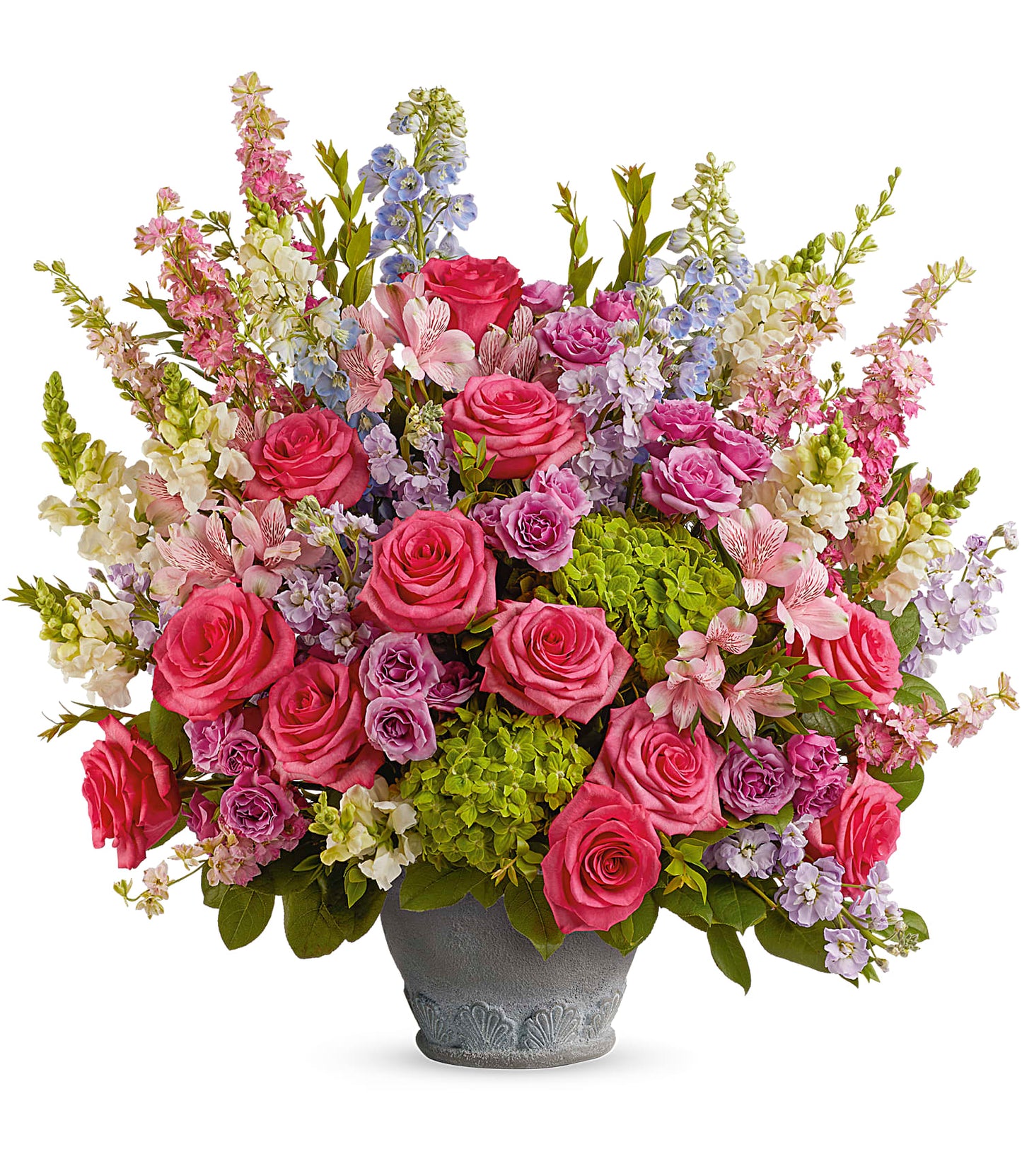 The Keep Blooming Bouquet features pink roses, pastel purple and blue flowers, green hydrangea, and lush greenery in a decorative Parisian Garden Pot, beautifully arranged for a stunning display.