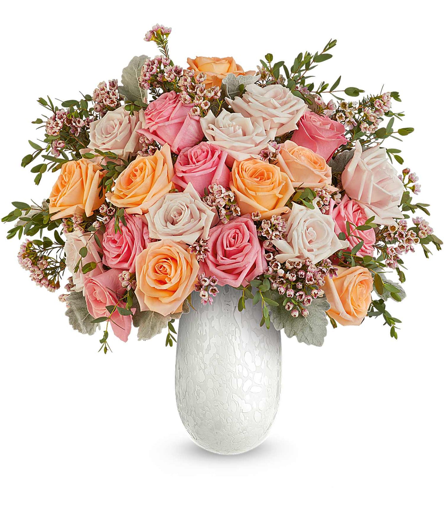 The Opal Garden Bouquet features pink, peach, and cream roses with pink filler flowers and greenery arranged in a textured white Amelia Vase for a charming display.