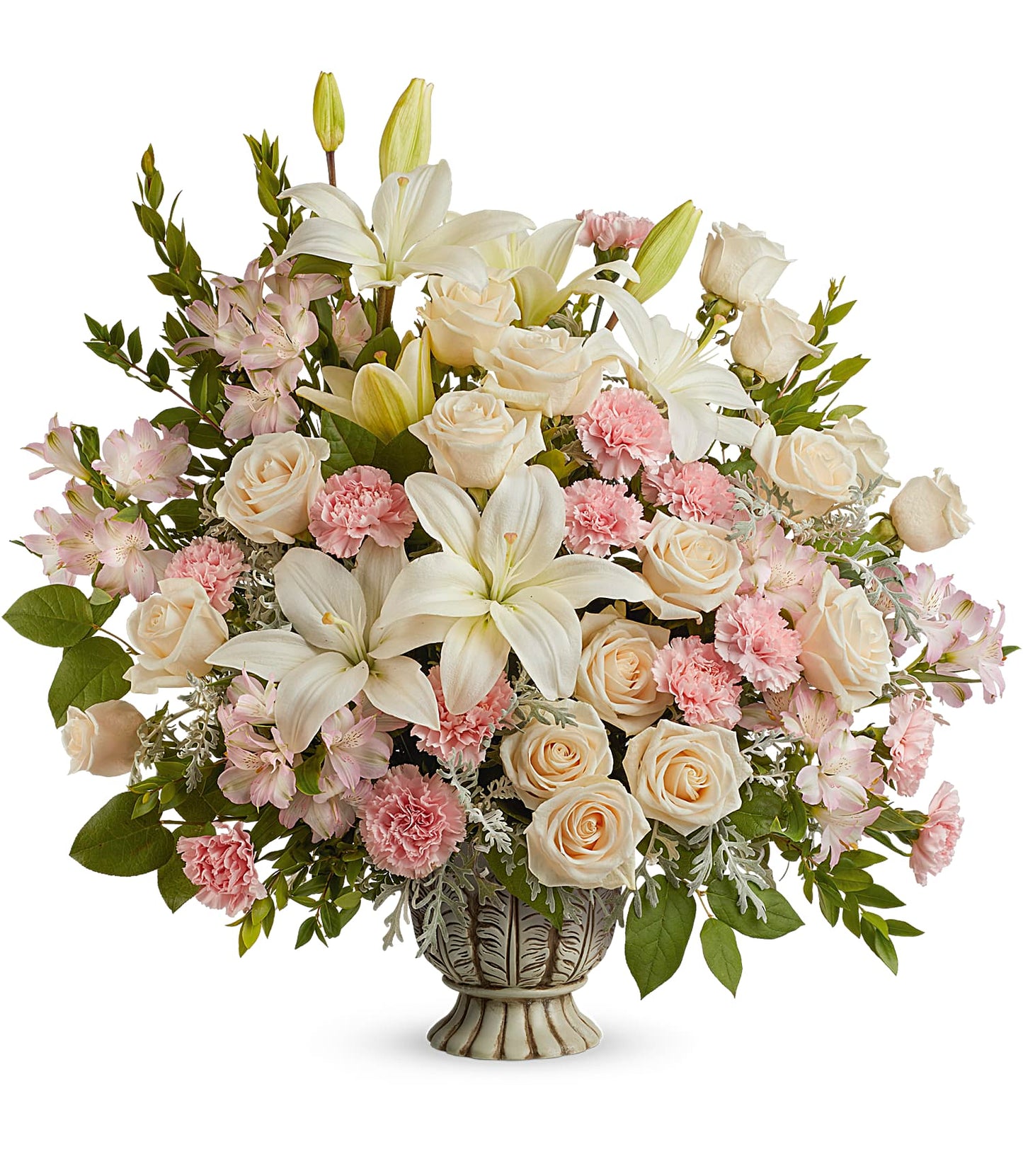 The Peaceful Joy Bouquet features white asiatic lilies, pale pink roses, pink carnations, crème roses, and assorted greenery for a soft, elegant display.