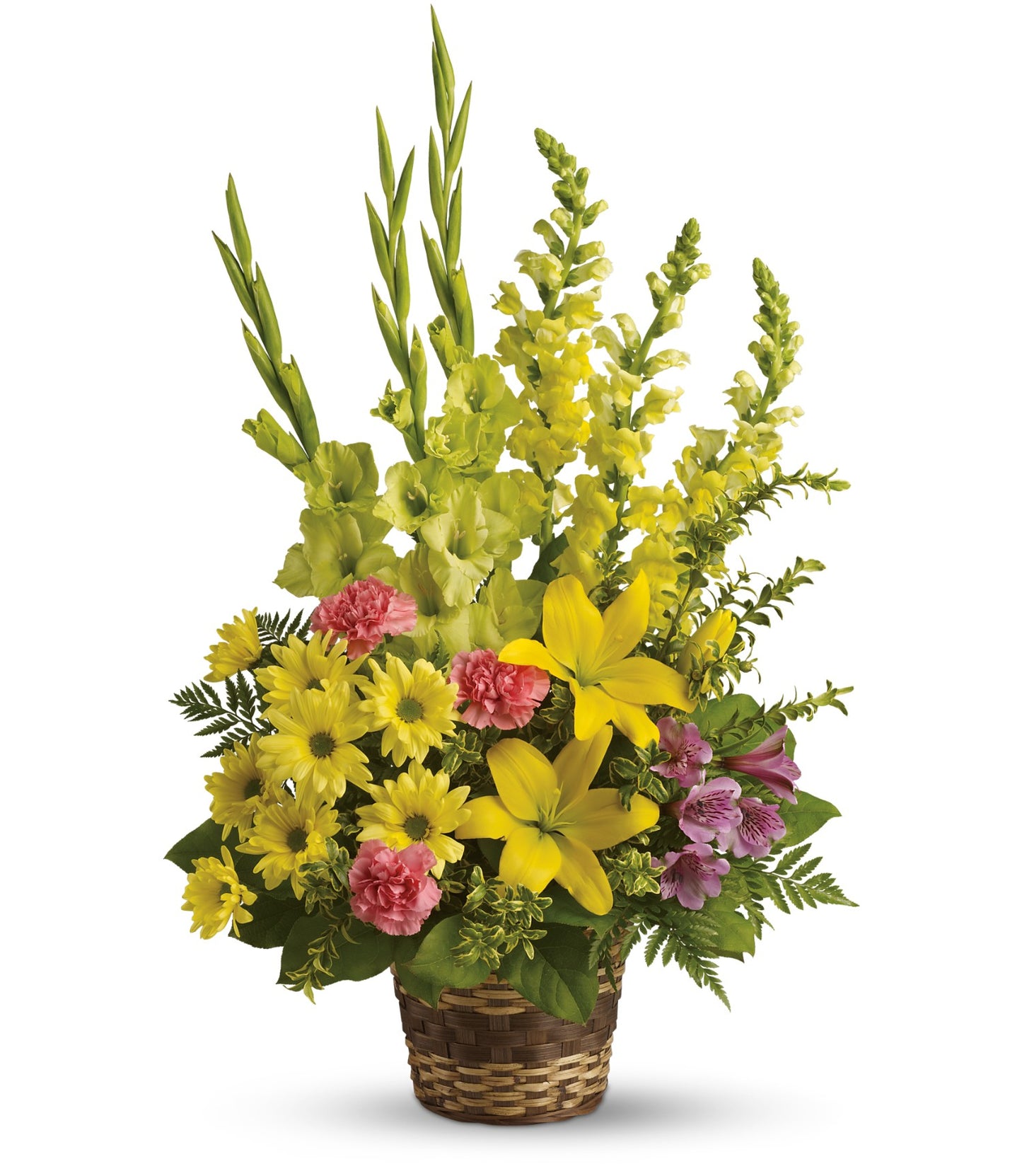 The TF Vivid Recollections is a woven flower basket featuring tall, vibrant yellow Asiatic lilies, snapdragons, daisies, pink carnations, purple alstroemeria, and lush greenery. Shown on a white background.