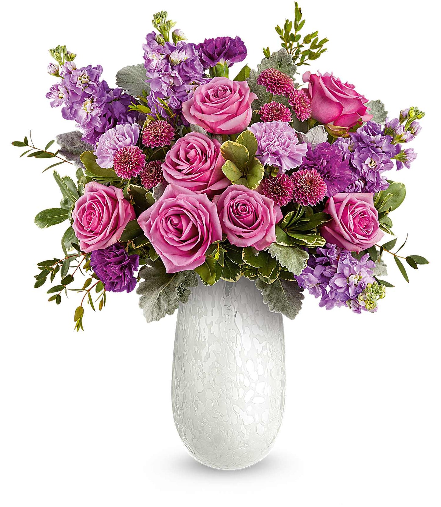 The Amelia Bouquet features pink and purple flowers, including lavender roses, purple carnations, and lush greenery arranged elegantly.
