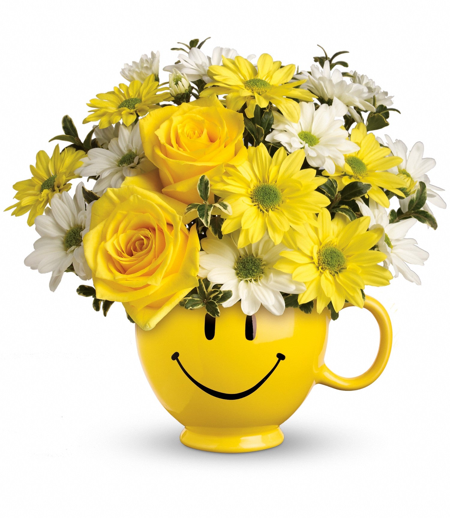 The TF Be Happy Bouquet features a cheerful mix of yellow roses, yellow daisies, and white daisies with greens, arranged in a bright yellow Be Happy® Mug adorned with a smiley face.