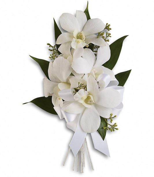 The Graceful Orchids Corsage by TF features a small bouquet of white dendrobium orchids with Italian ruscus and seeded eucalyptus, tied with a white ribbon bow and set against a white background.
