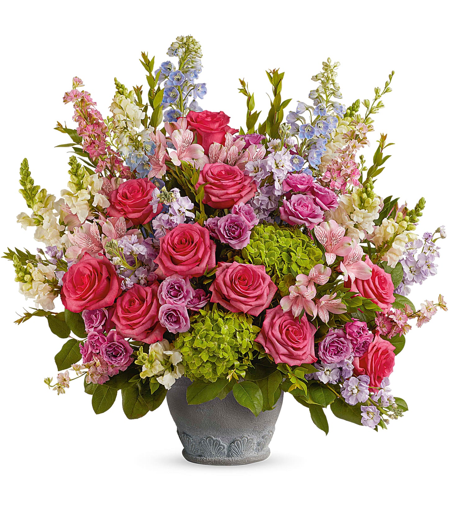 The Keep Blooming Bouquet features pink roses, pastel purple and blue flowers, green hydrangea, and lush greenery in a decorative Parisian Garden Pot, beautifully arranged for a stunning display.