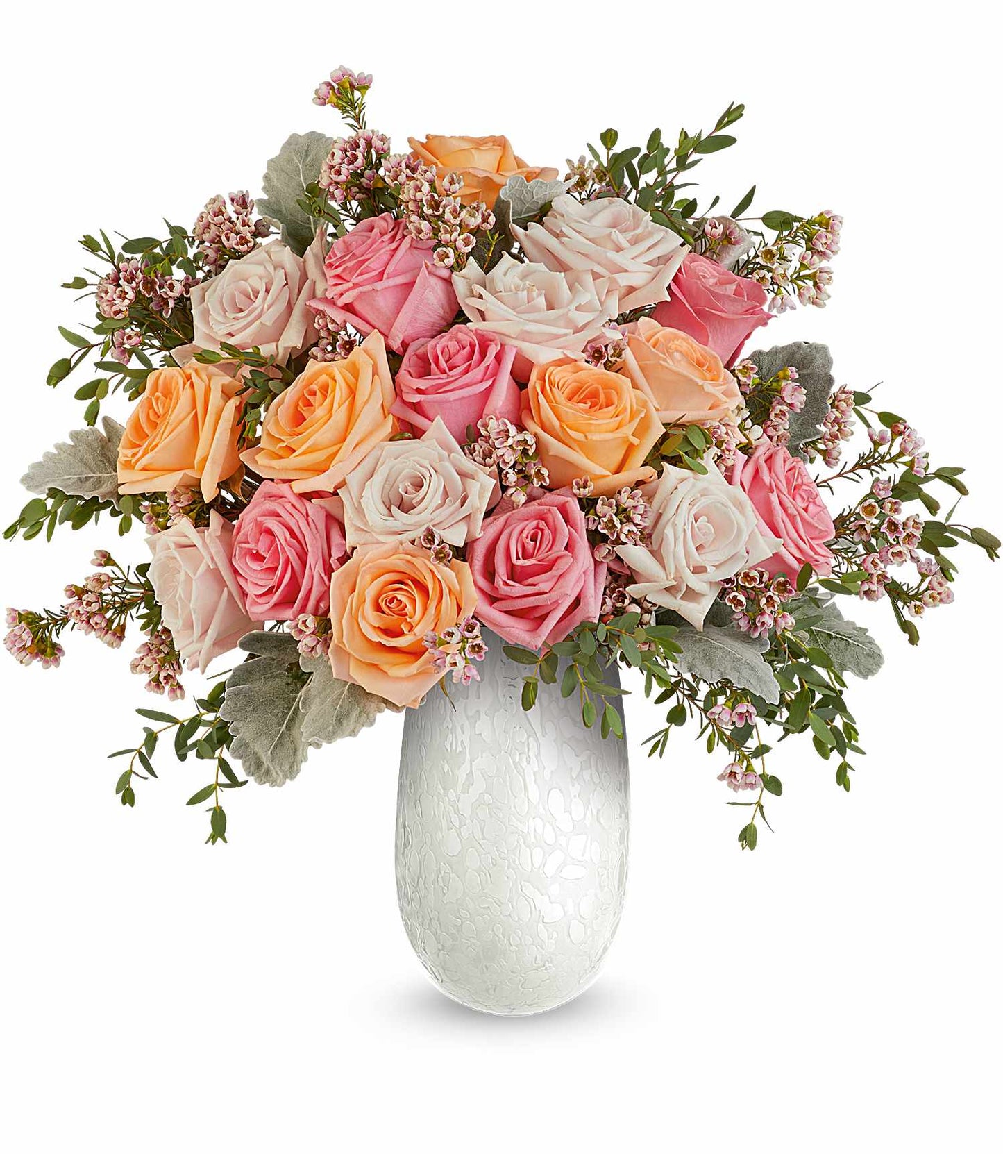 The Opal Garden Bouquet features pink, peach, and cream roses with pink filler flowers and greenery arranged in a textured white Amelia Vase for a charming display.