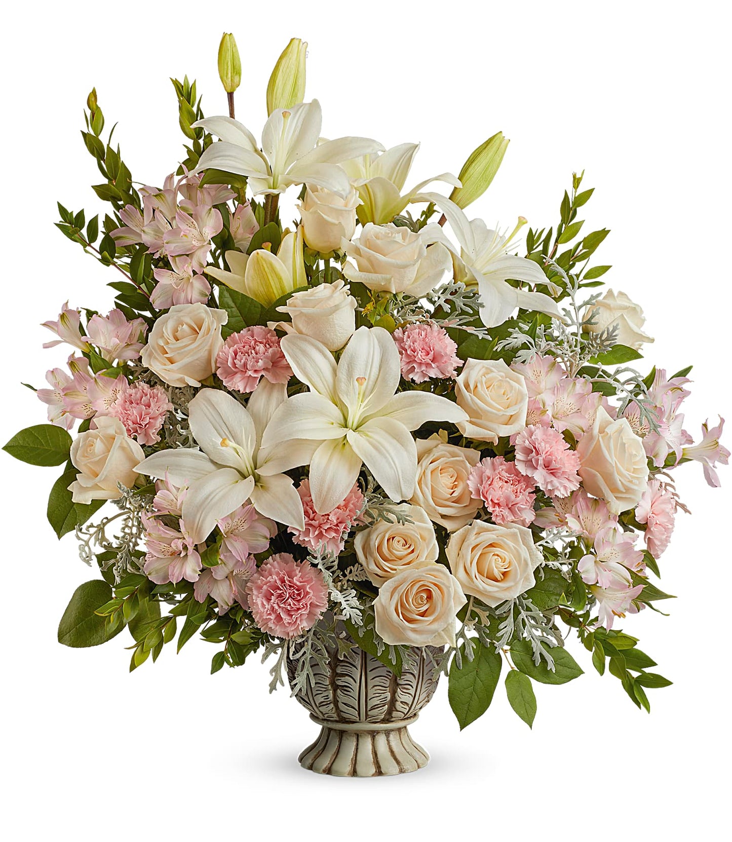The Peaceful Joy Bouquet features white asiatic lilies, pale pink roses, pink carnations, crème roses, and assorted greenery for a soft, elegant display.