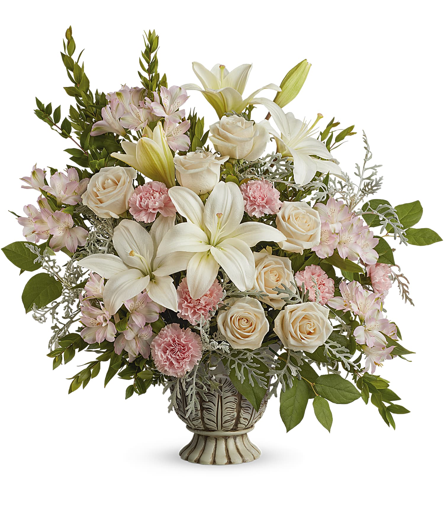 The Peaceful Joy Bouquet features white asiatic lilies, pale pink roses, pink carnations, crème roses, and assorted greenery for a soft, elegant display.