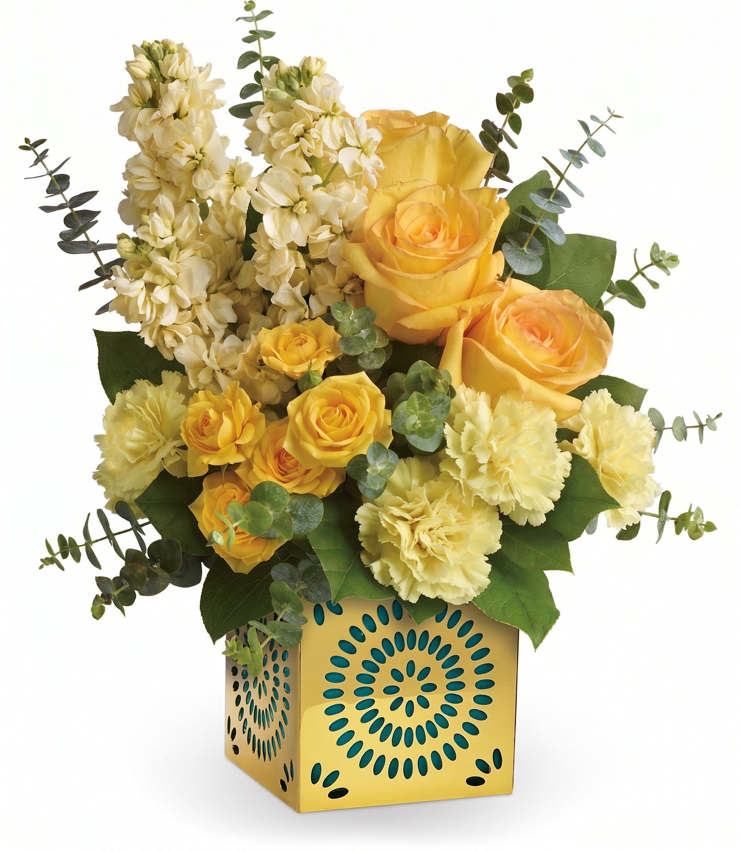 The Shimmer Of Thanks Bouquet features yellow roses, yellow carnations, and stock with eucalyptus in a Celebrate in Style cube—a yellow vase with blue and green geometric patterns.