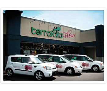 flower delivery vehicles in front of our Montreal store